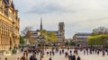 Paris / France - April 04 2019: Square in front of Hotel de Ville, the MunicipalityÃÂ of Paris, full of resting people at sunset.